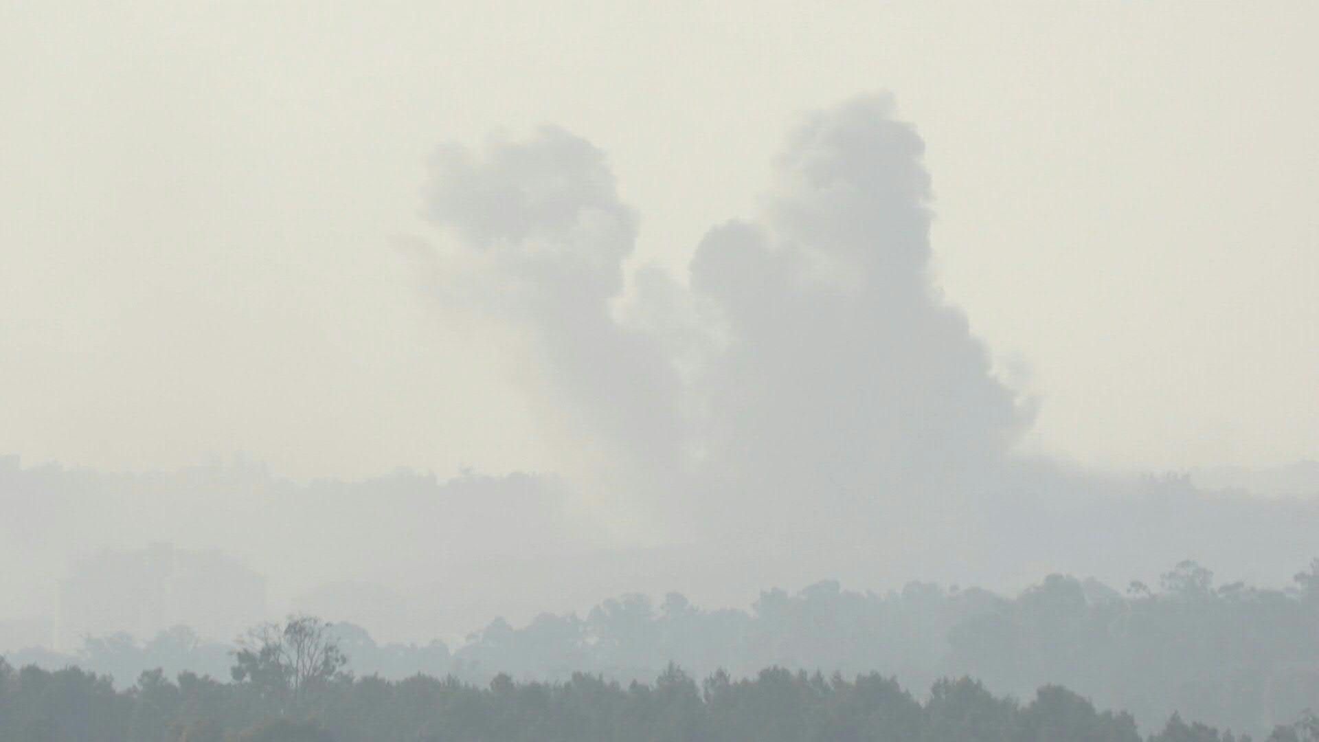 Large smoke cloud on horizon after strike on Gaza's Bureij, seen from Israel