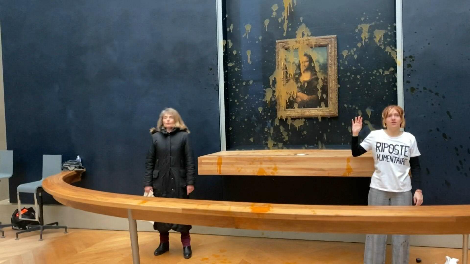 Environmental activists throw soup on glass-protected Mona Lisa in Paris