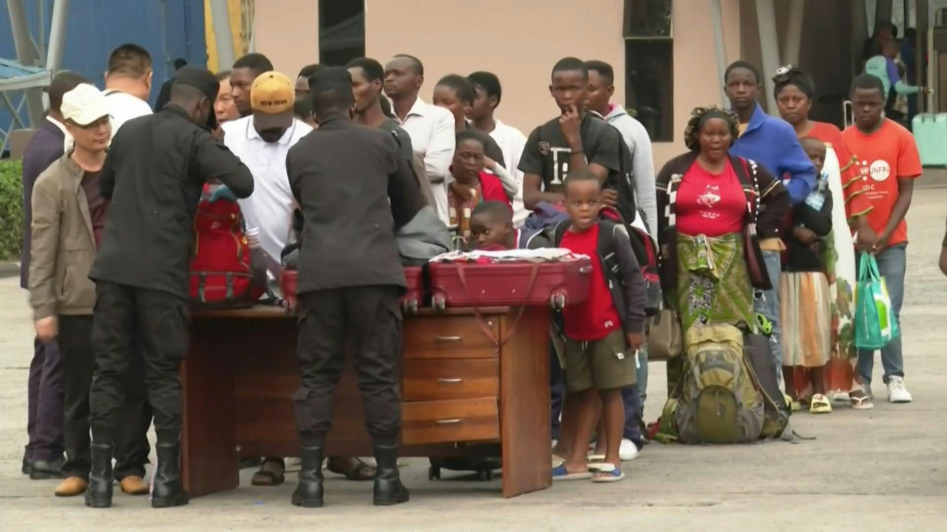 World Bank staff cross the border from the DRC into Rwanda