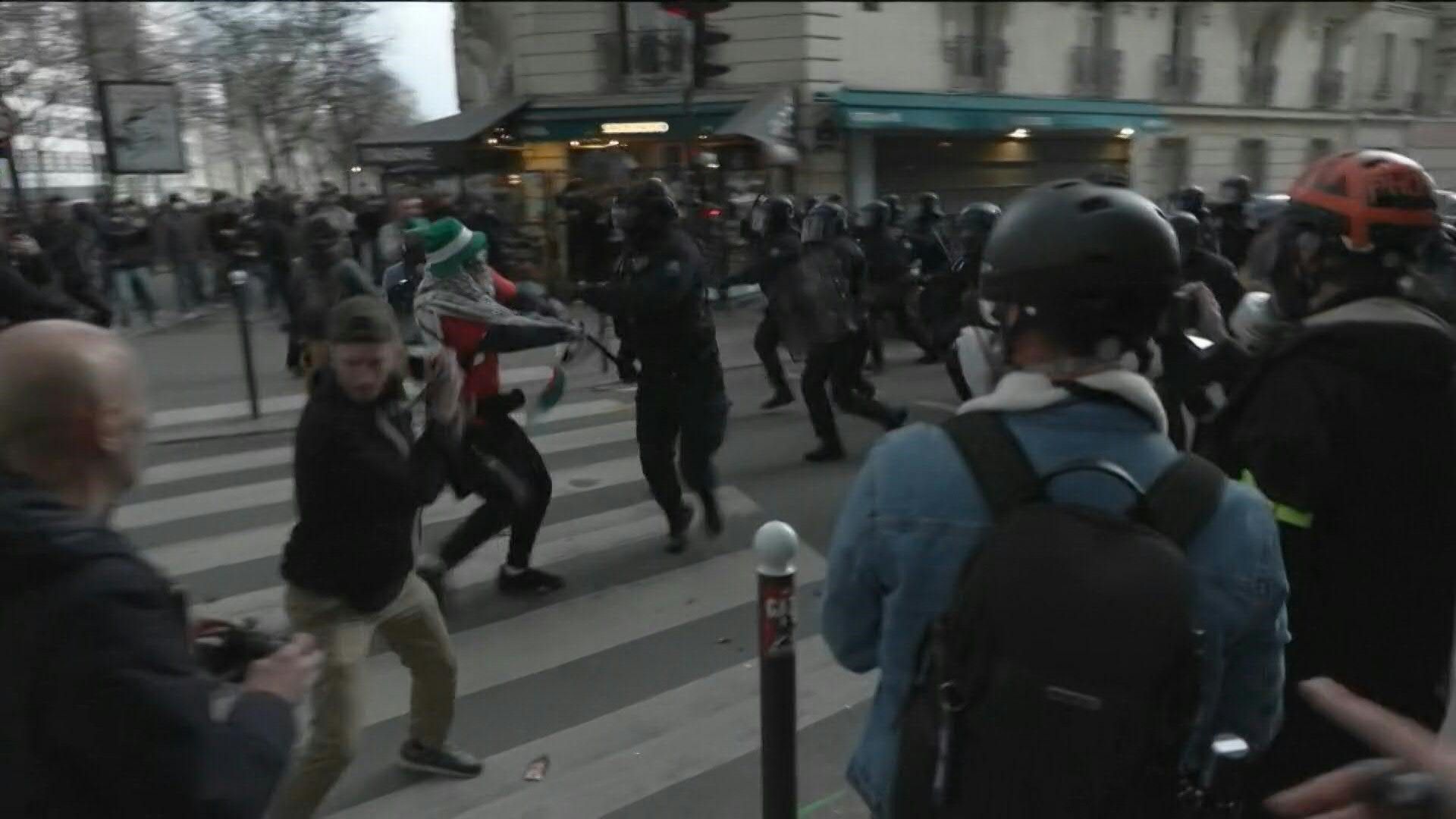 Clashes between police officers and demonstrators during protest against racism and far-right