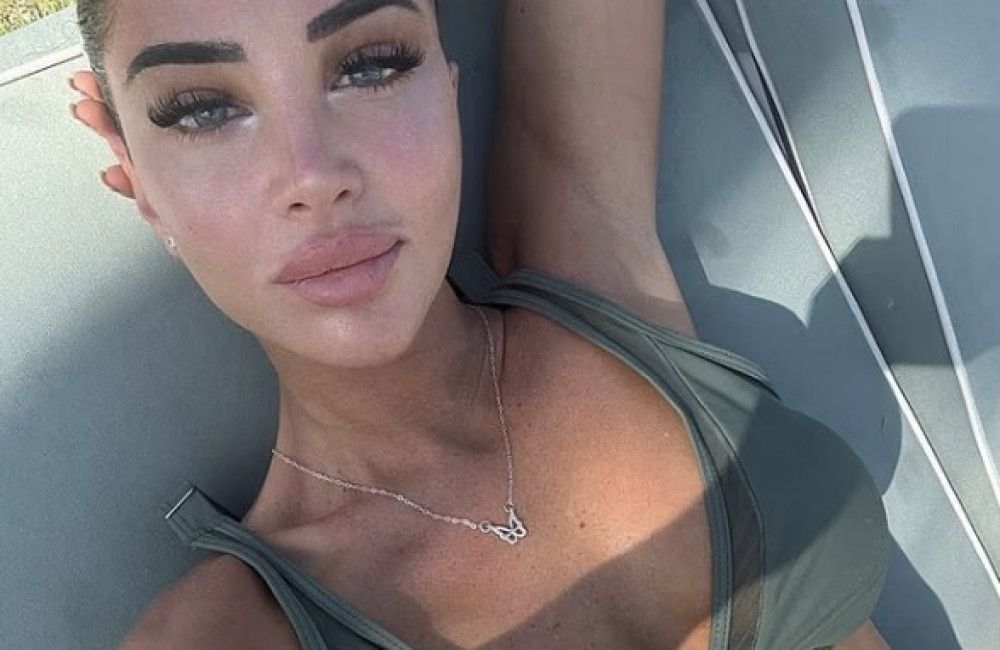 Tulisa Contostavlos shows off stunning figure in sizzling green two-piece