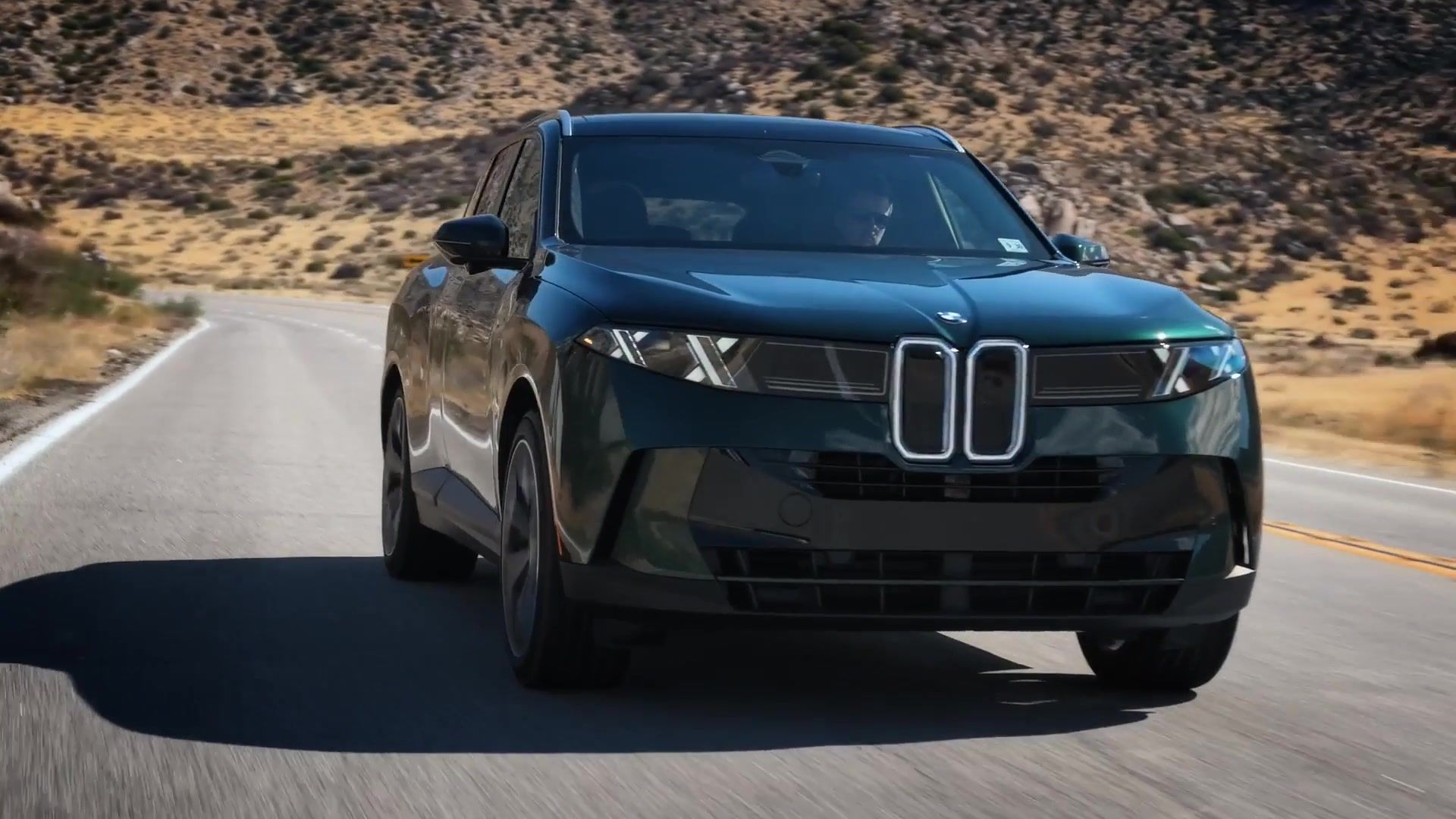 The new BMW X5 40 xDrive in Vancouver Green Metallic Driving Video
