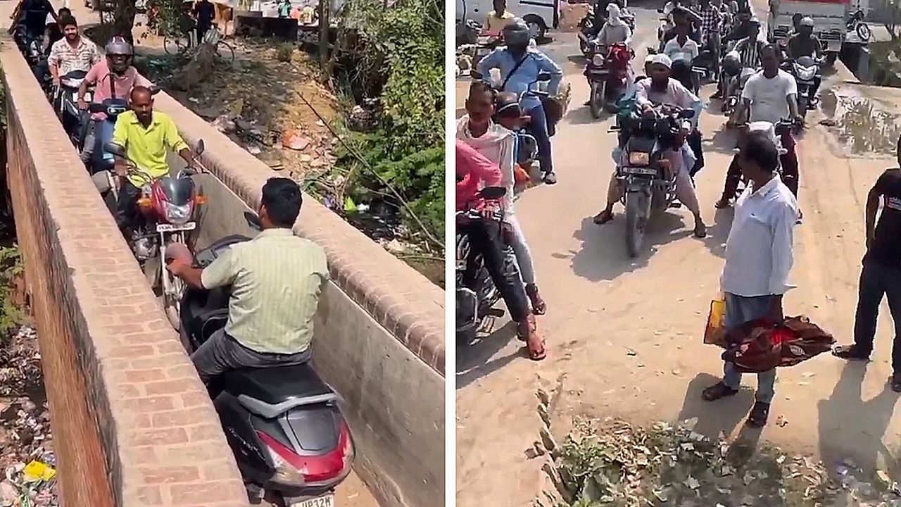 Road-raging motorcyclists engage in hilarious traffic-blocking standoff on bridge in India