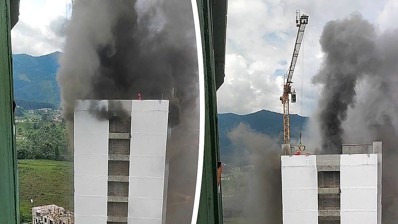 Heroic crane operator rescues worker from top of burning building