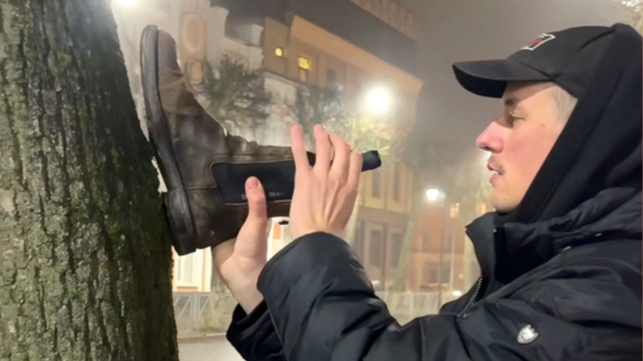 Man hilariously opens wine bottle with a boot after ditching the corkscrew