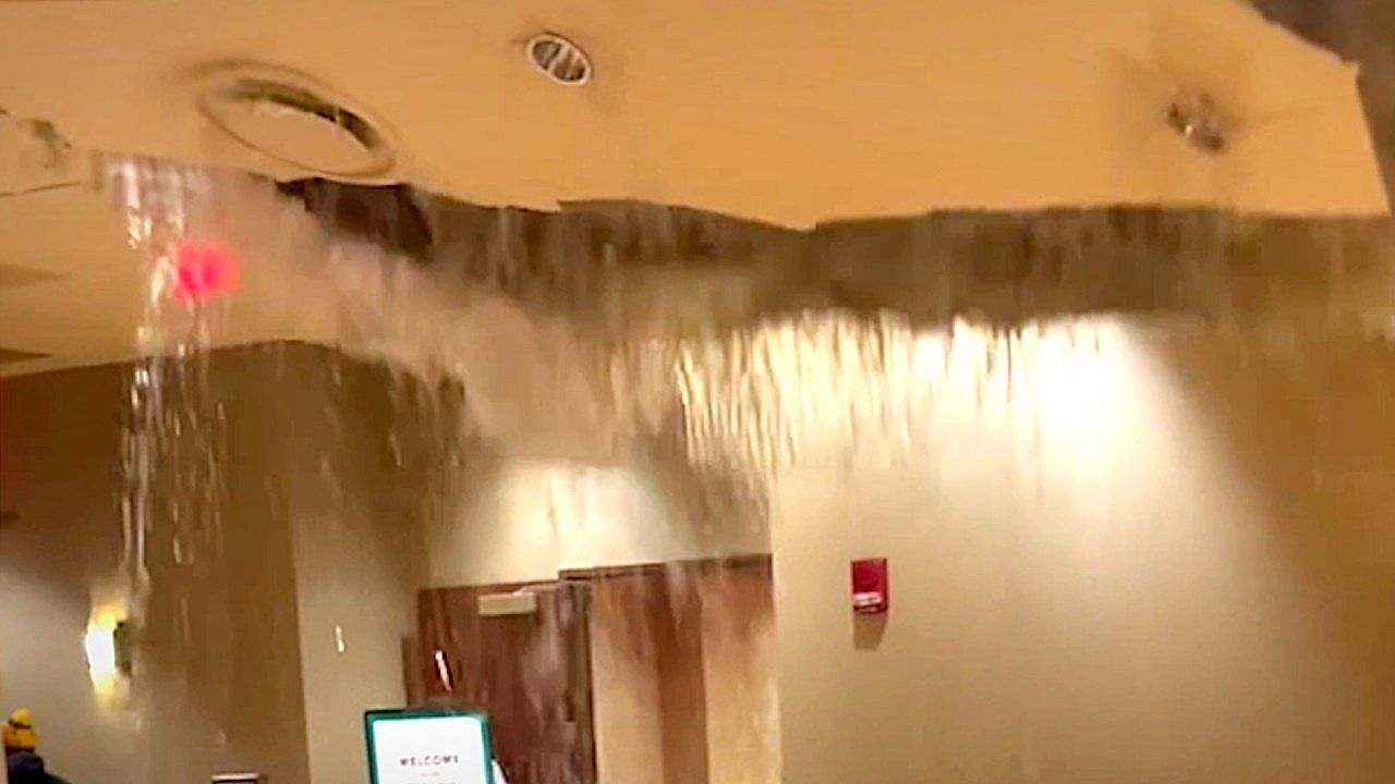 Video: Hotel lobby ceiling emergcy after water floods interior in Oklahoma