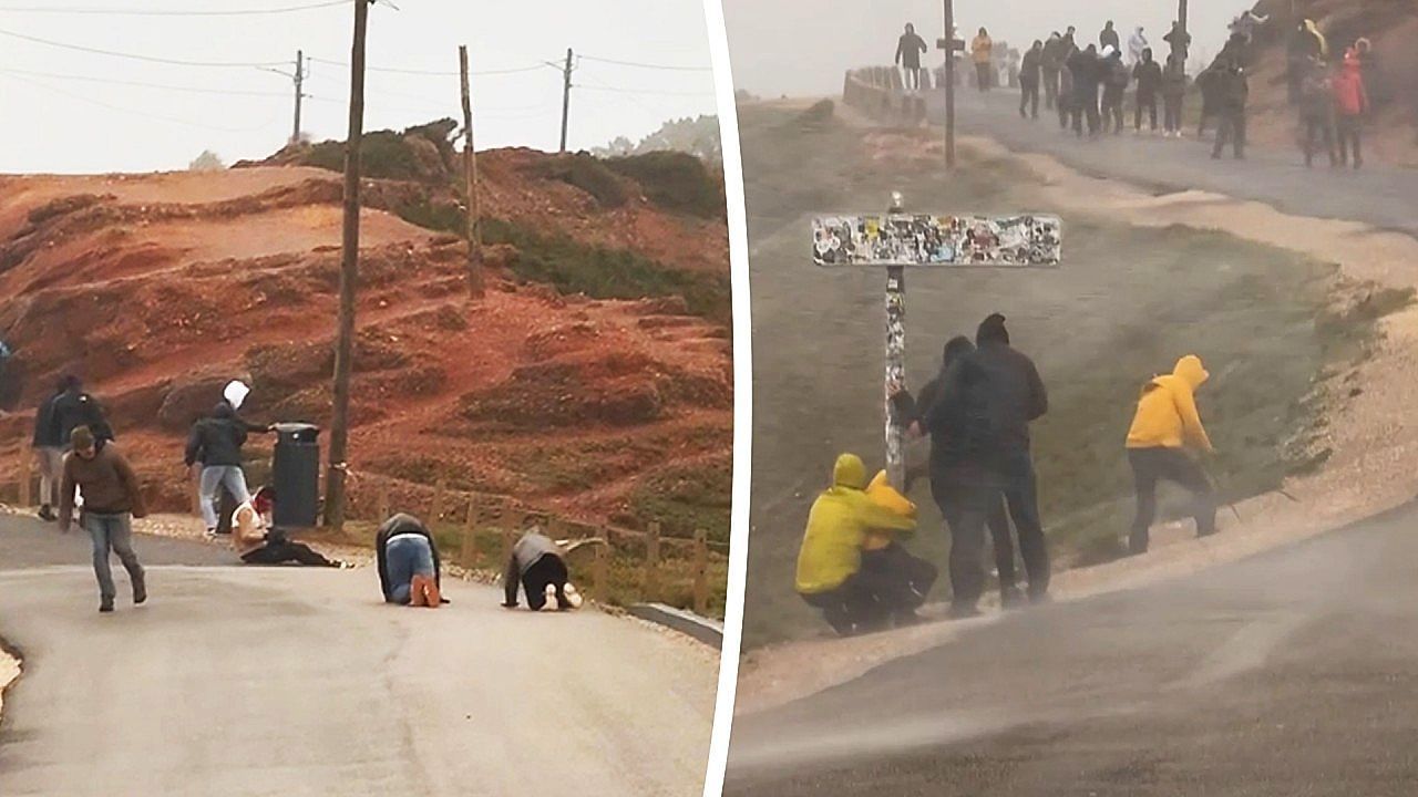 Video: Sudden windstorm sends people crawling for safety along Portugal's coast