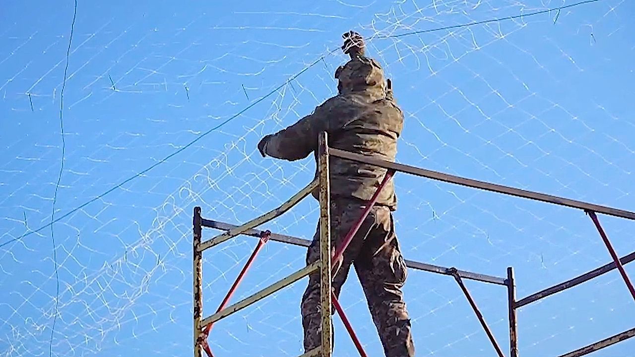 Video: Ukraine installs miles of anti-drone netting over roads