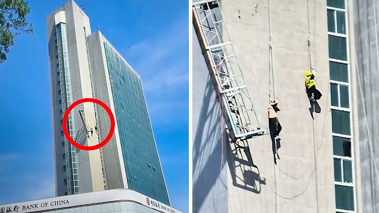 Video: Plattform gibt nach: Arbeiter hängen an Bankgebäude zwischen Himmel und Erde
