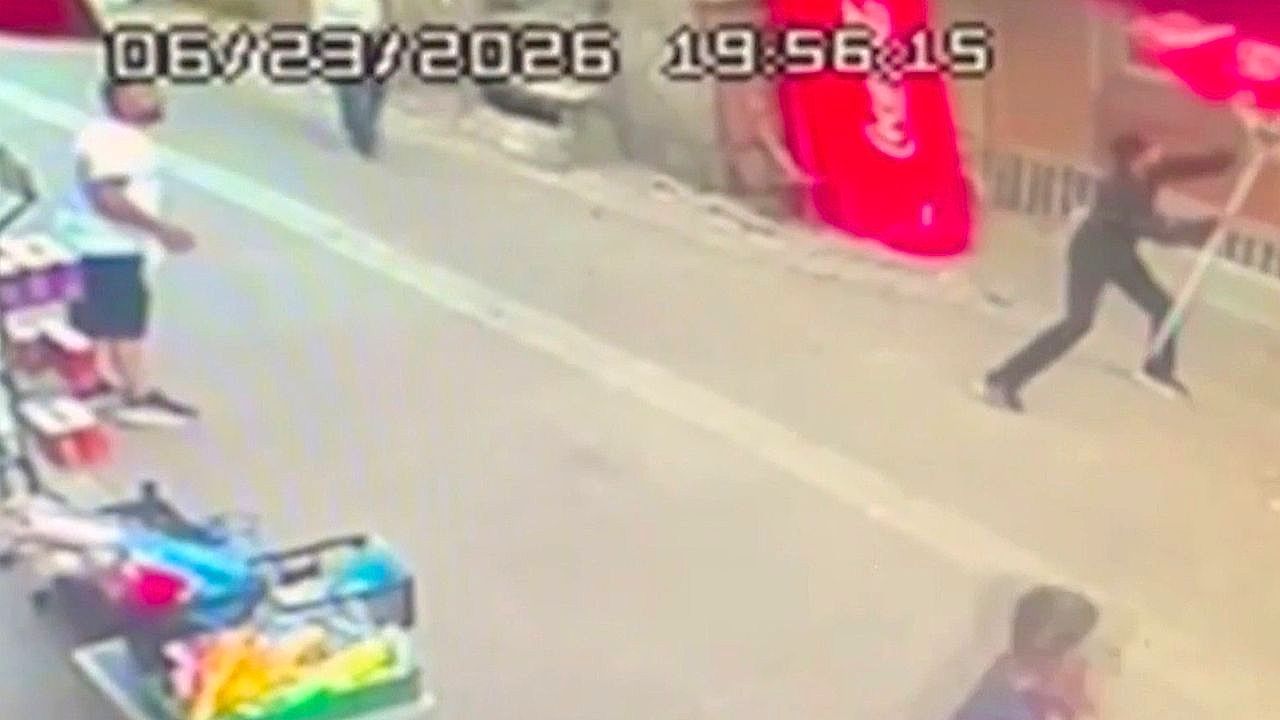 Video: Quick-thinking local catches cat falling from seventh floor using ice cream shop umbrella