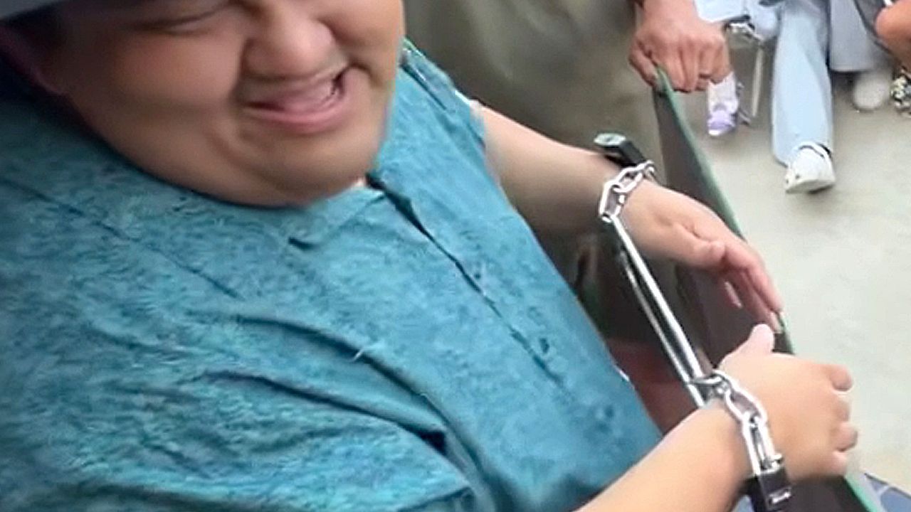 Funny Number: Magician Gets Audience Riled Up with Handcuff Trick