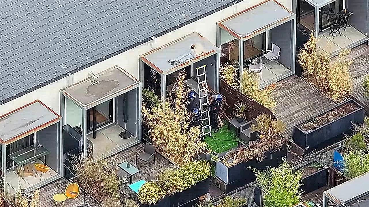 Video: Police end 48-hour rooftop standoff after suspect falls asleep on roof