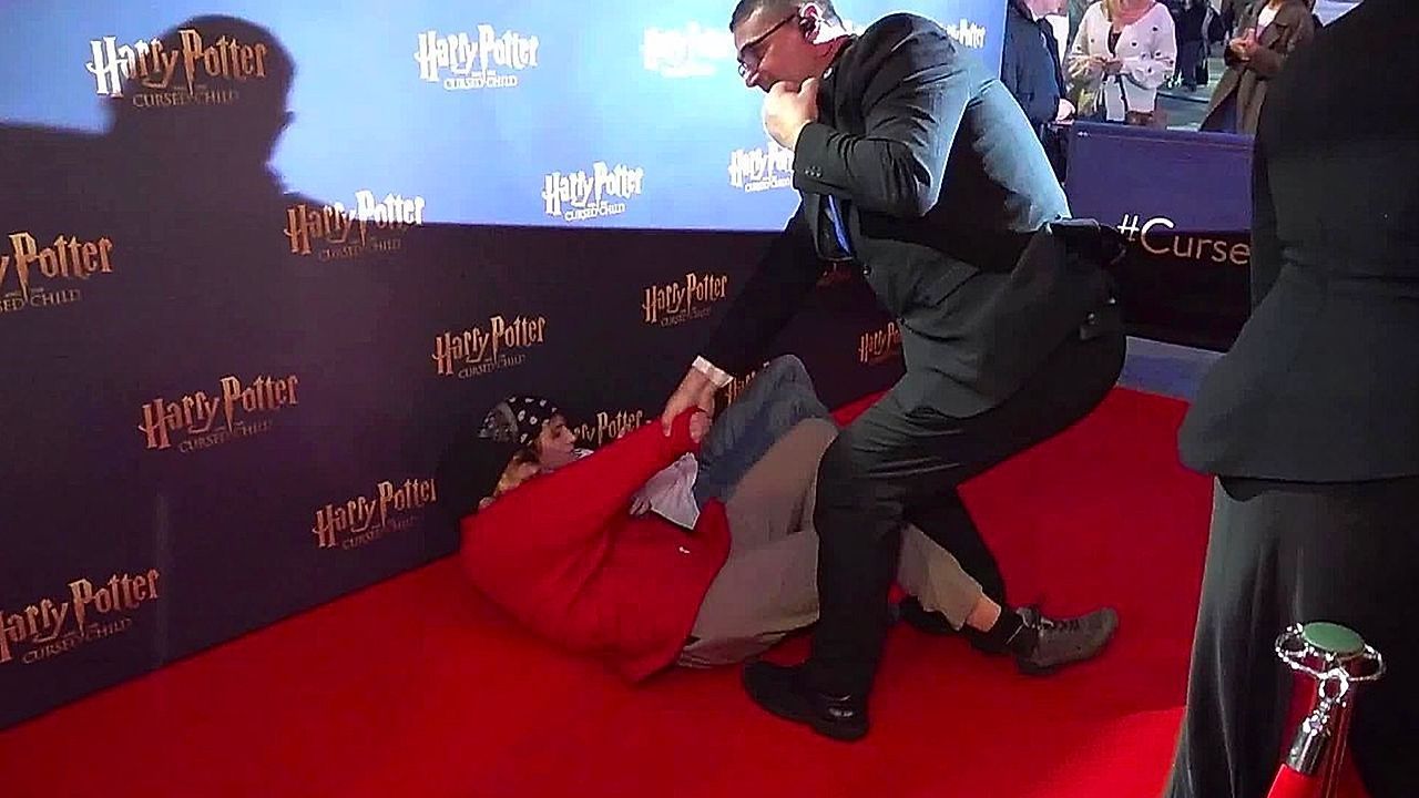 Trans rights protesters rush Harry Potter red carpet in London