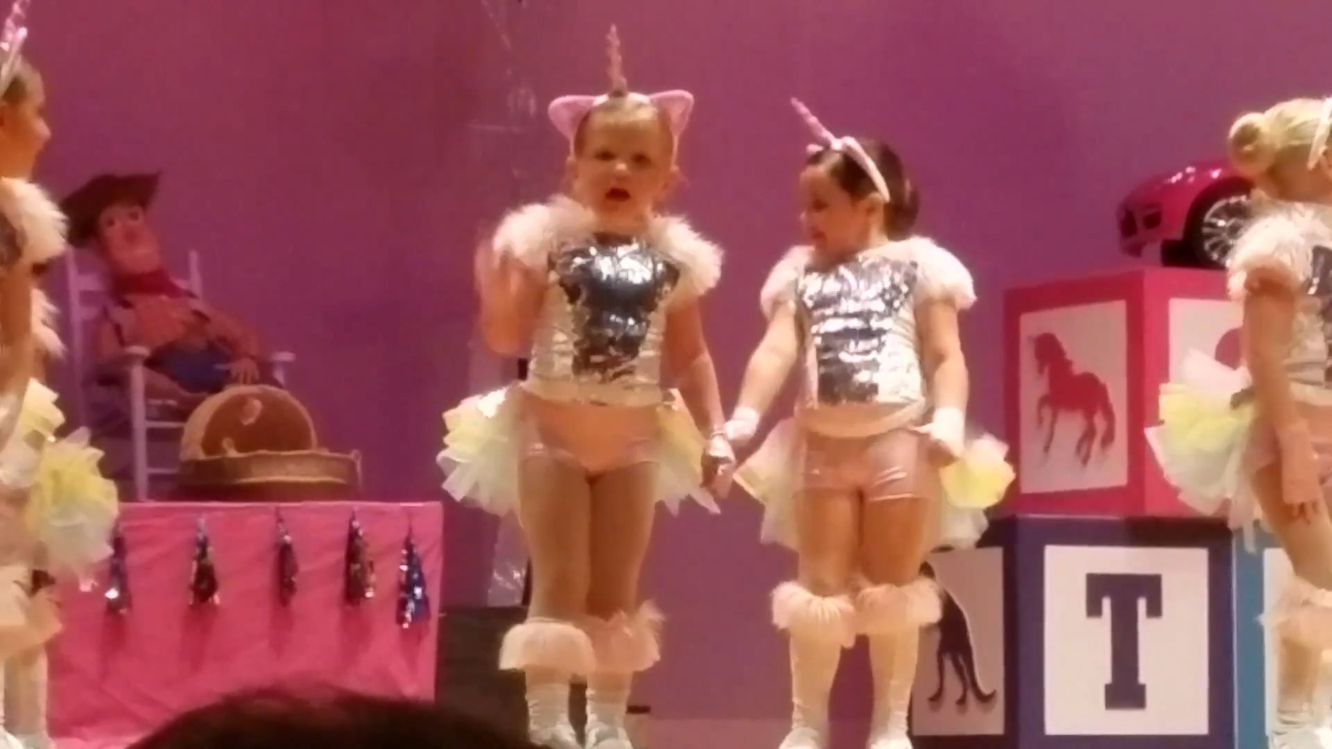 Little girl gives father a telling-off during her performance